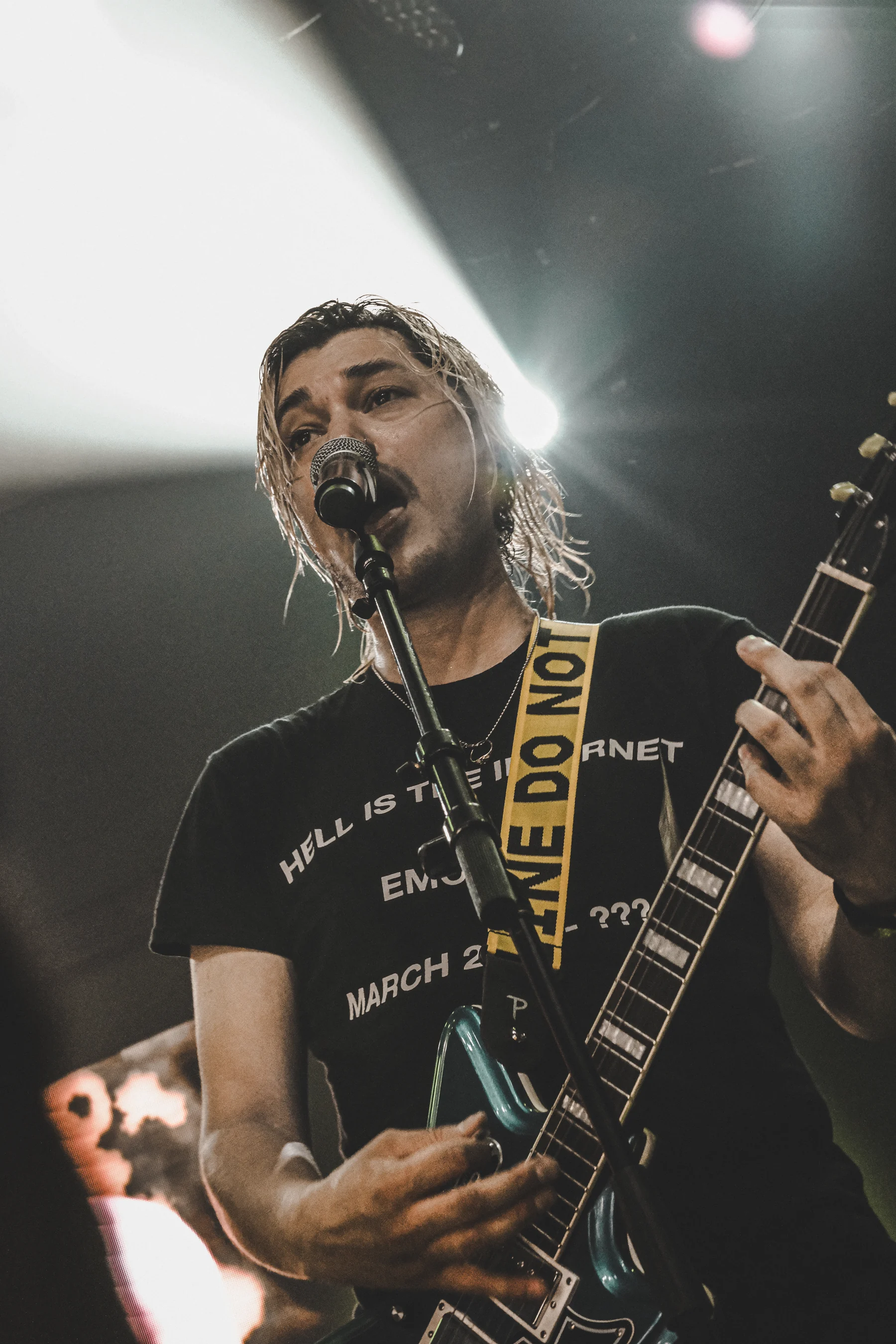 Zach Villa performing guitar live